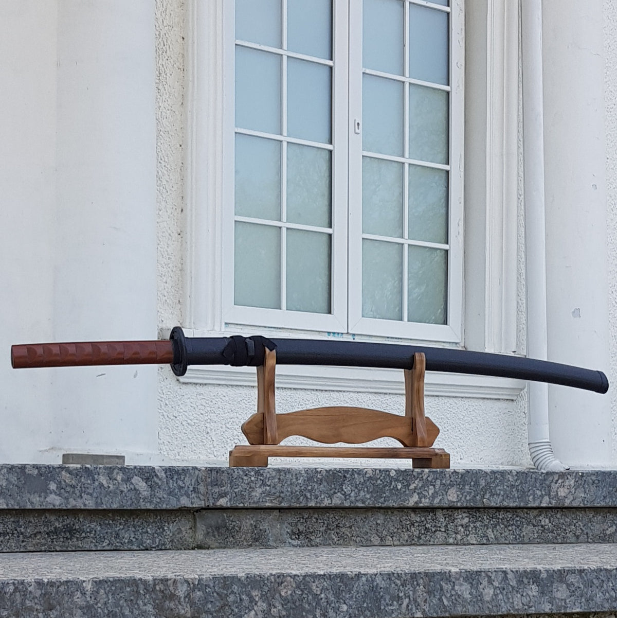 Elegant wooden stand for sword display – ideal for collectors and martial artists
